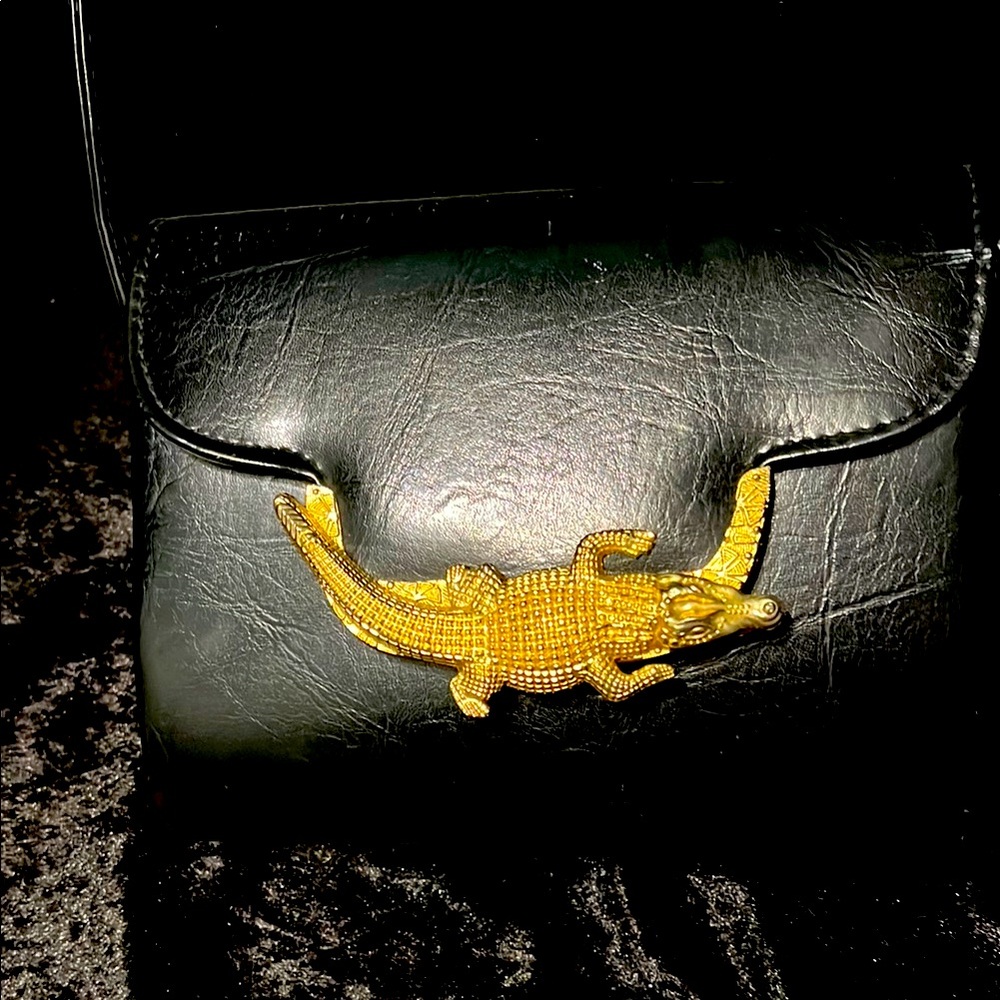 Black Reptile-Themed Bag with Gold Accent